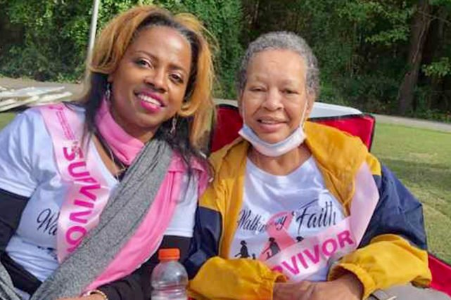 Two women sitting next to each other