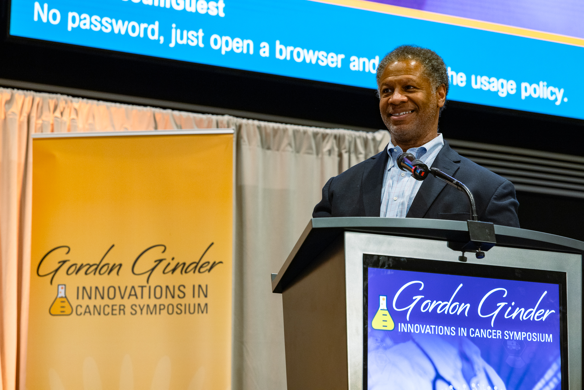 Robert A. Winn, M.D., Massey Cancer Center Director, speaking at podium at 2025 Ginder Symposium