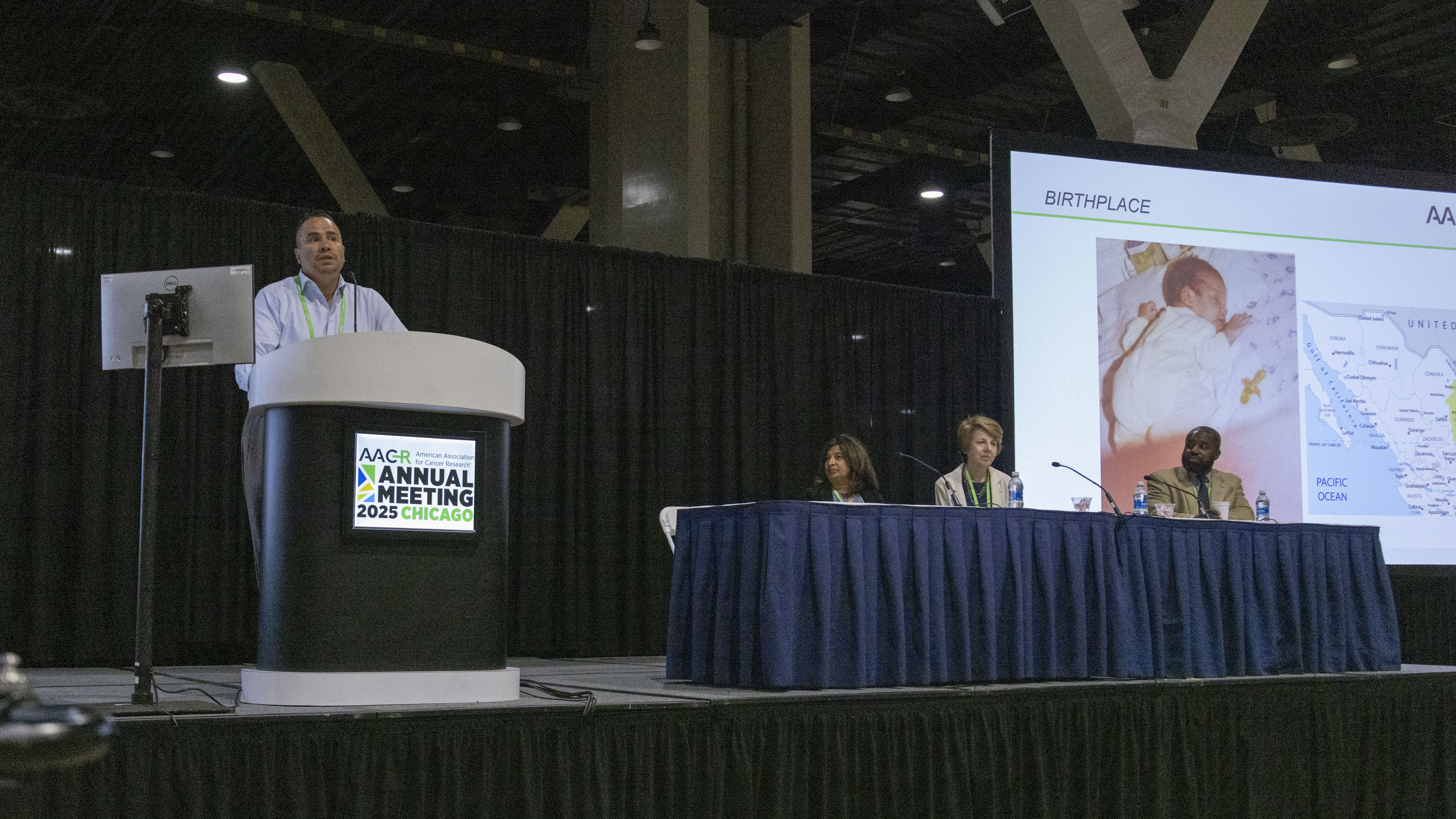 Dr Jose Trevino speaking at podium at AACR 2025
