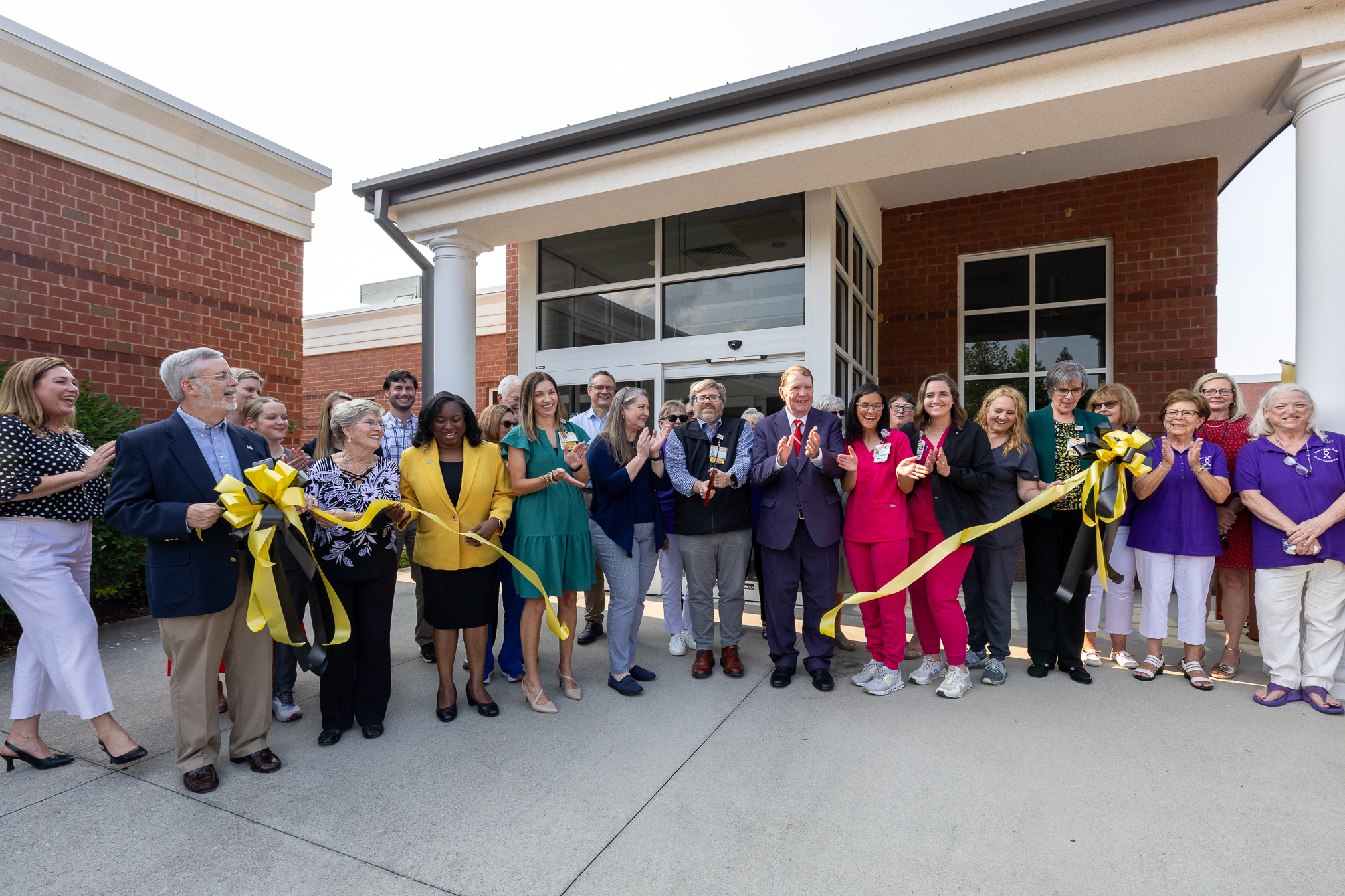 Group of VCU Health affiliates cutting ribbon at Community Memorial Hospital