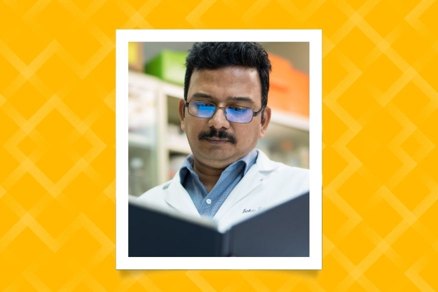 Photo of Venkata Battula, Ph.D. headshot with yellow patterned background