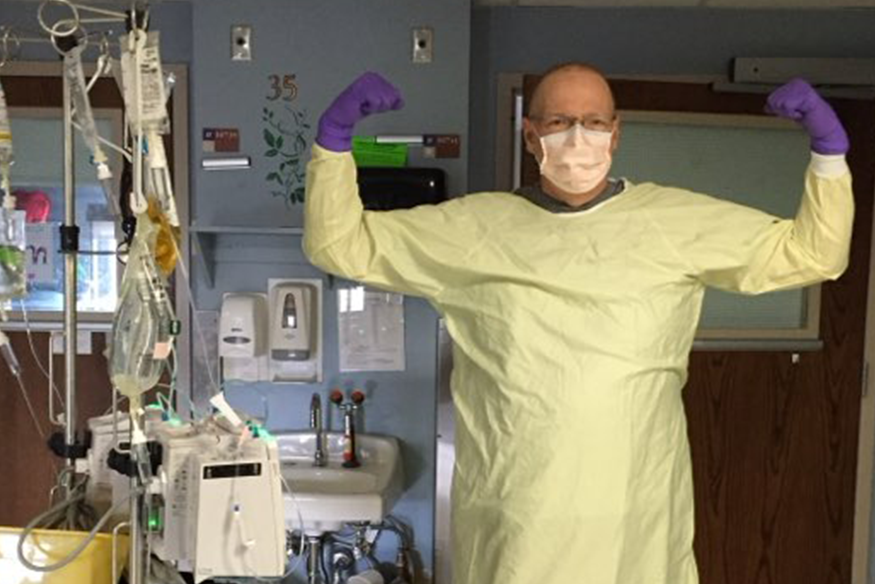 Jeff Lanham posed during treatment with arms curled