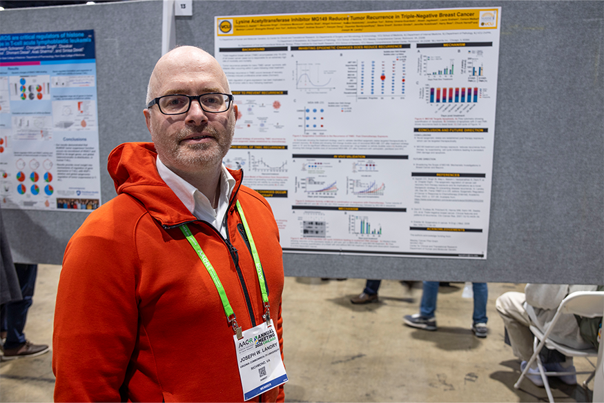 Joseph Landry, Ph.D., with his research