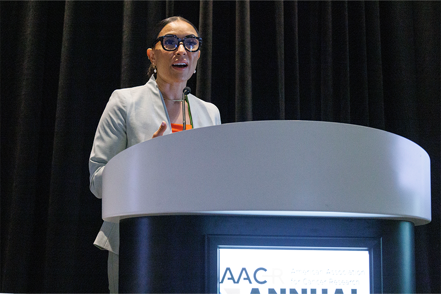 Katherine Y. Tossas, Ph.D., M.S speaking at podium
