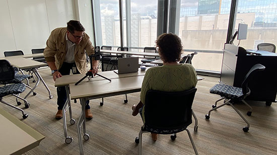 VCU Massey social media manager Keith Jones setting up for a video interview