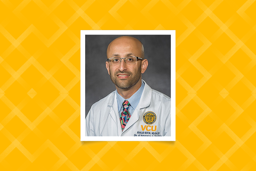 Portrait of man in Massey branded white coat on yellow graphical background