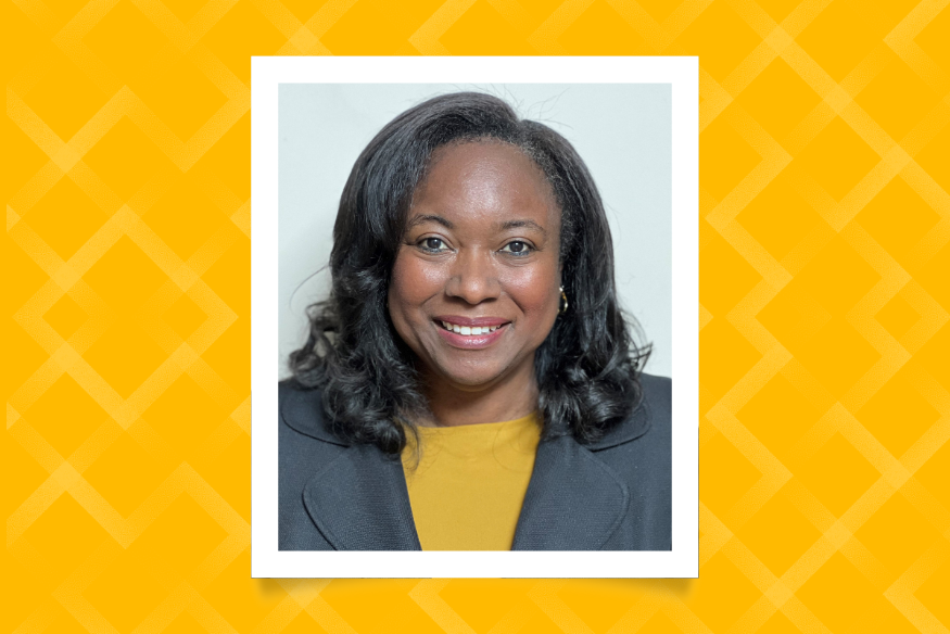 Close up shot of brown woman in on yellow background