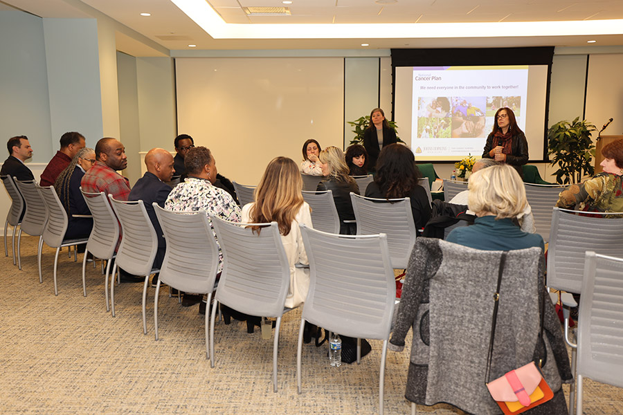 Elizabeth Jaffee, M.D., leading a conversation with dozens of students and trainees from VCU.