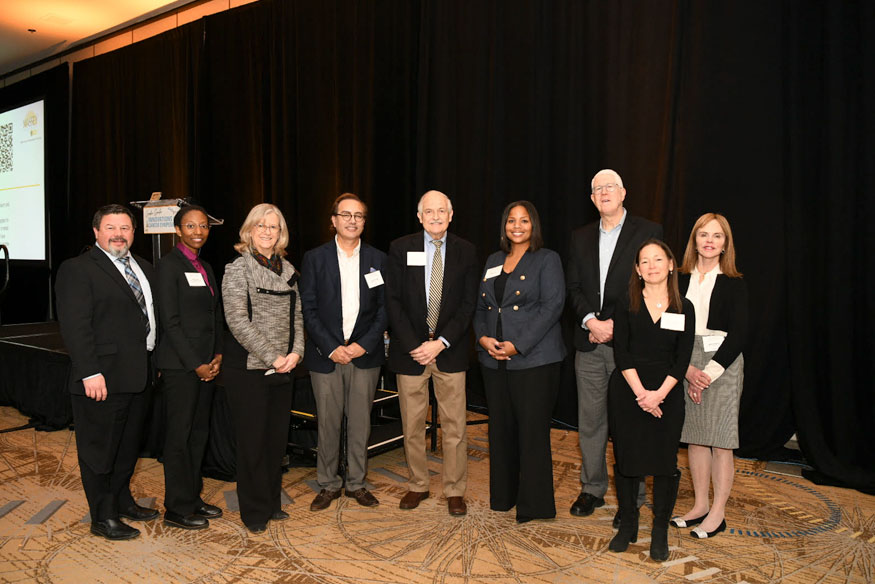 Group of researchers presenting at Gordon Ginder Innovations in Cancer Symposium